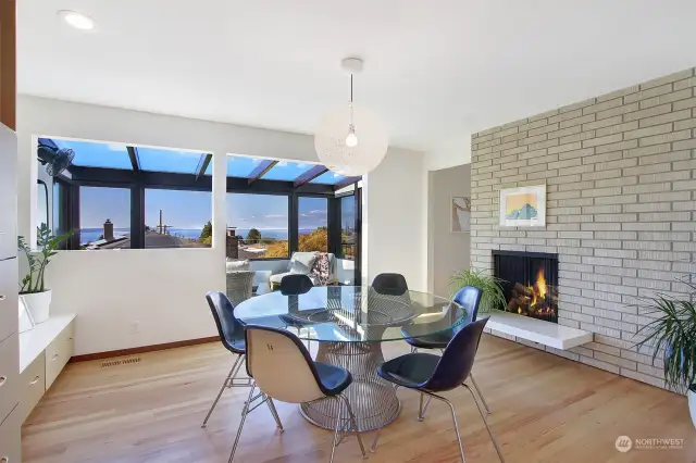 Dining room with fireplace and views of Puget Sound