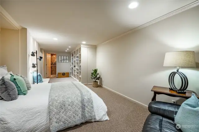 Lower level, flex space with murphy bed + storage