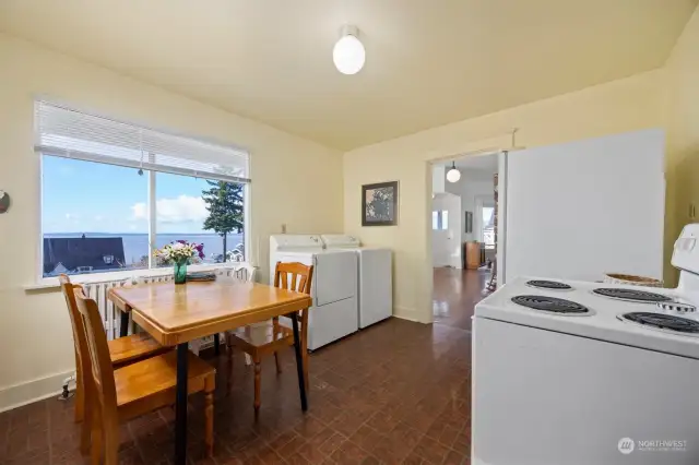 Looking toward the informal dining area from the kitchen.