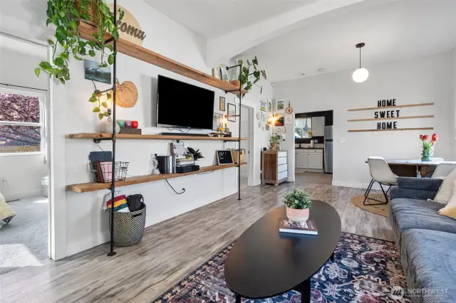 Enter into the living space with extra high ceilings and plenty of natural light!