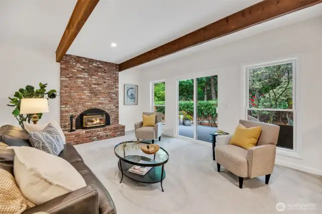 Brick fireplace with gas insert to provide added warmth on those chilly NW evenings