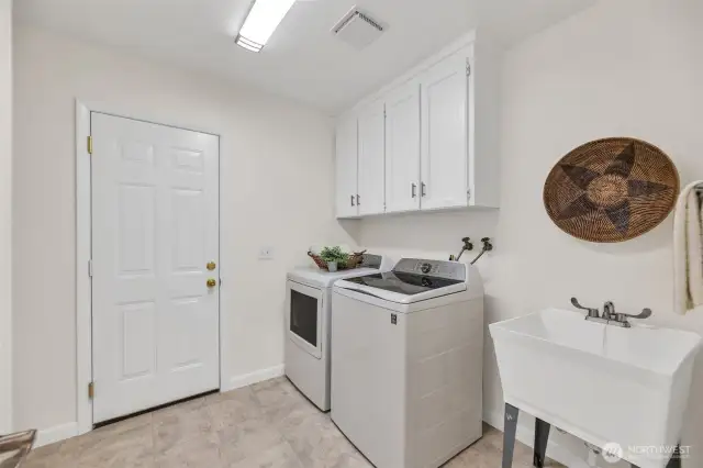 Spacious laundry room - mudroom connects to the garage