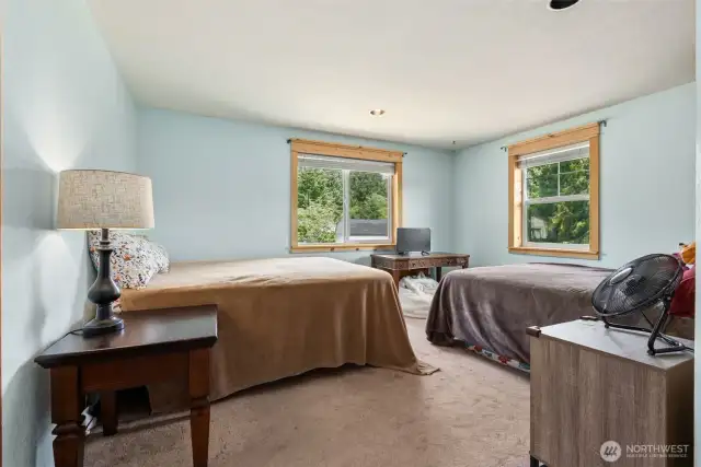 Expansive primary suite offers plenty of space for flexible furniture arrangements & a serene, comfortable retreat.