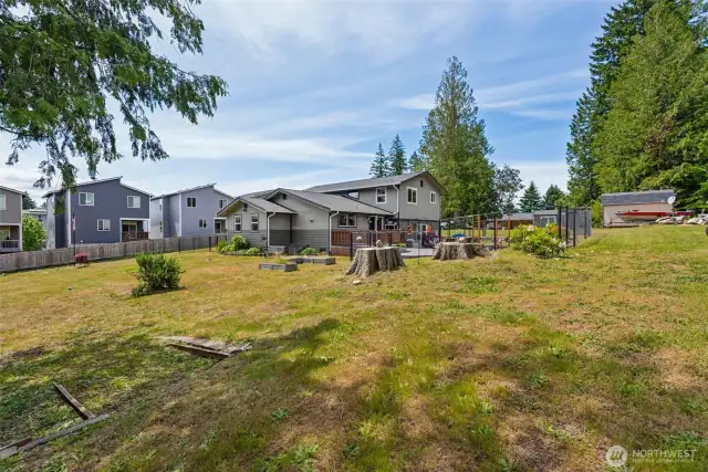 Expansive backyard offers endless potential—plenty of room to play, garden, gather, or simply enjoy the outdoors in peace.