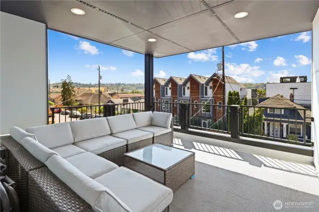 Another end-unit biggie!  Spacious covered deck with views to the south & west.