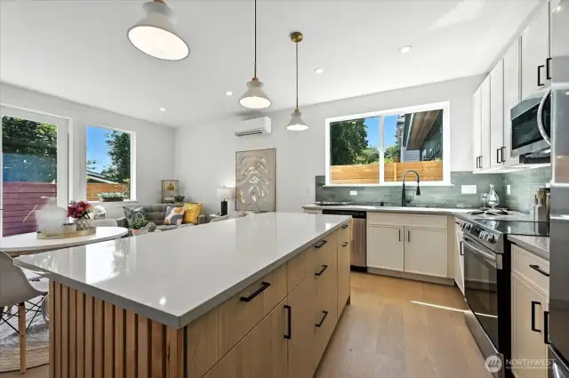 Gourmet kitchen with large island and quartz counters