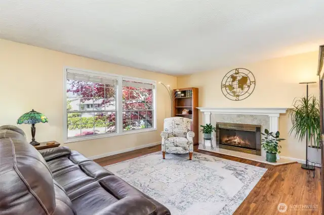 Upstairs main living space with cozy fireplace.
