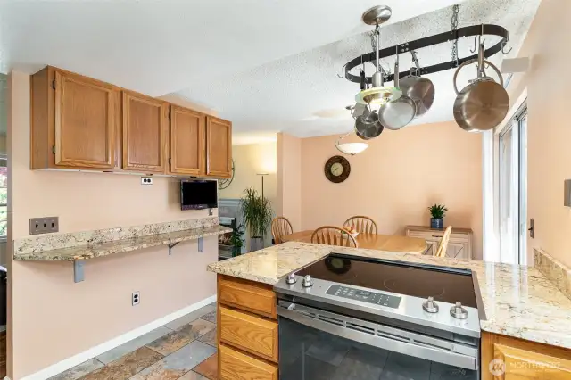Another view of the kitchen highlighting the added storage and functionality.