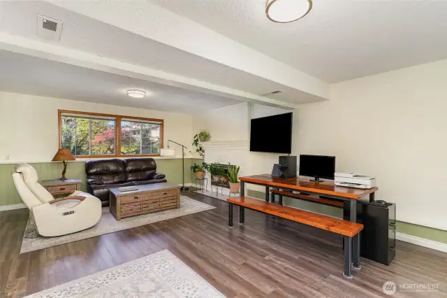 Use as a playroom, family room, or mixed office space!