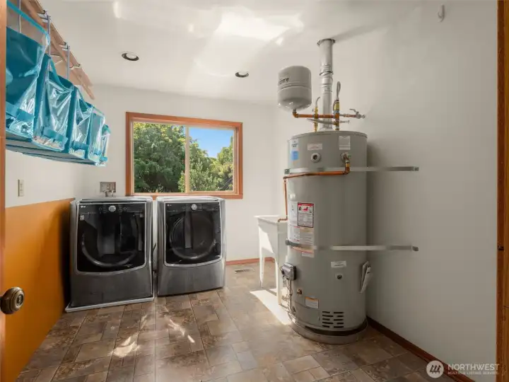 Spacious laundry room with plenty of storage space