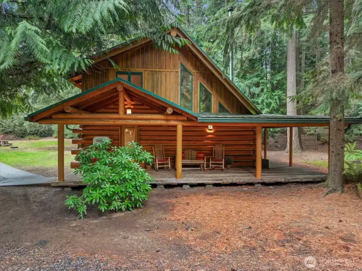 Charming UPDATED LOG home offers the perfect blend of Rustic Character & Modern Updates.