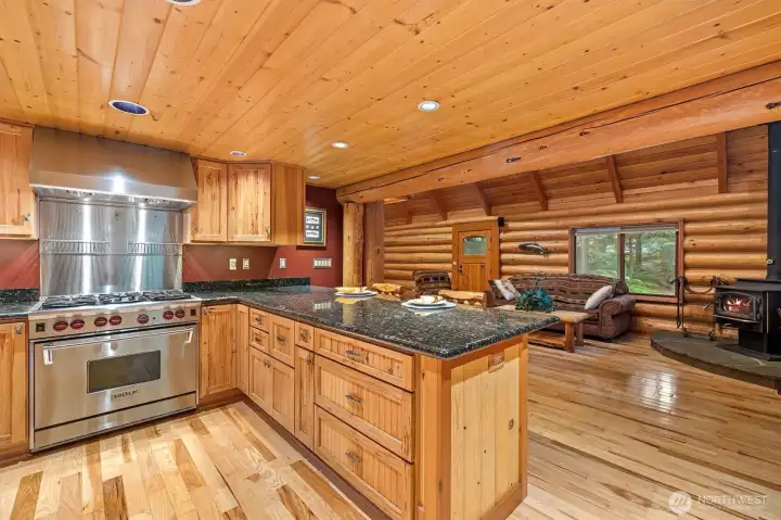 Thoughtfully Remodeled Kitchen shines w/a 6-burner WOLF range, Granite counters & 2 Lazy Susans.