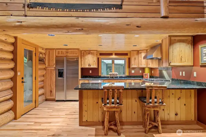 Generous Breakfast bar, Newer Flooring & Gorgeous Etched Entry Door.