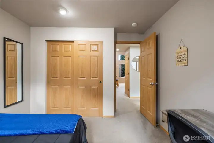 Bedroom number two with double door closet.