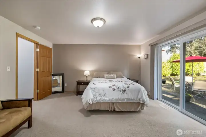 Large primary has patio access (hot tub conveys).