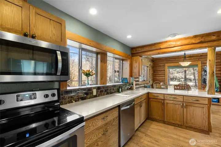 Stainless Appliances & Workspace -  Stainless appliances and ample prep space make this kitchen both practical and inviting, with easy flow to the dining and great room areas