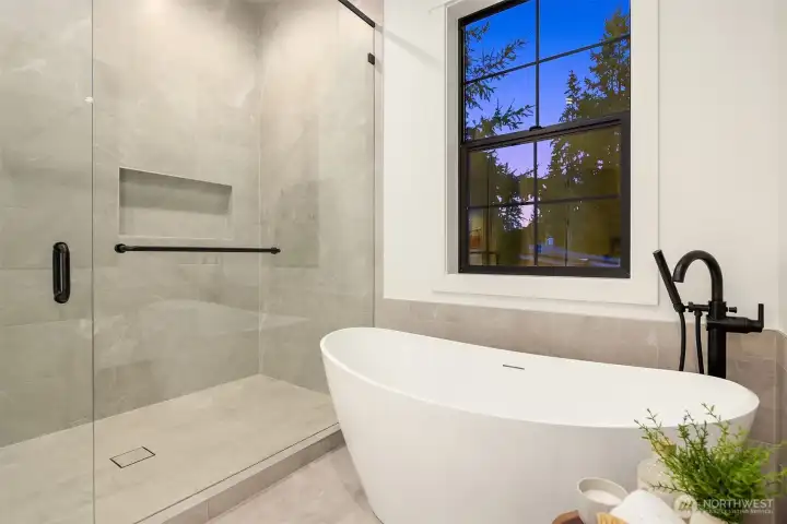 Spa-like soaking tub in primary suite