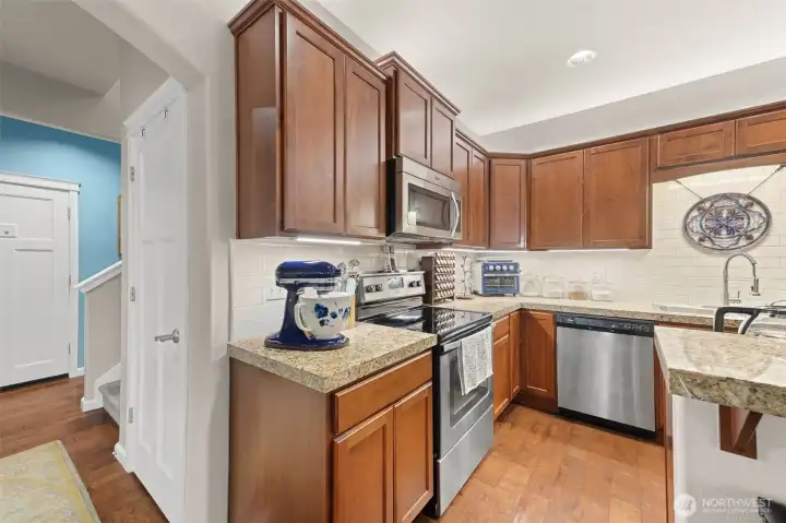 Kitchen with hall closet and door to Garage