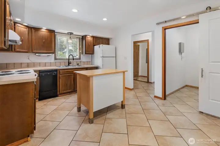 Tiled flooring in the spacious kitchen.