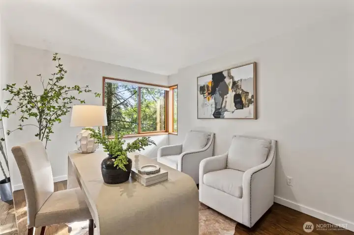 The main level bedroom is flex for guests or office.