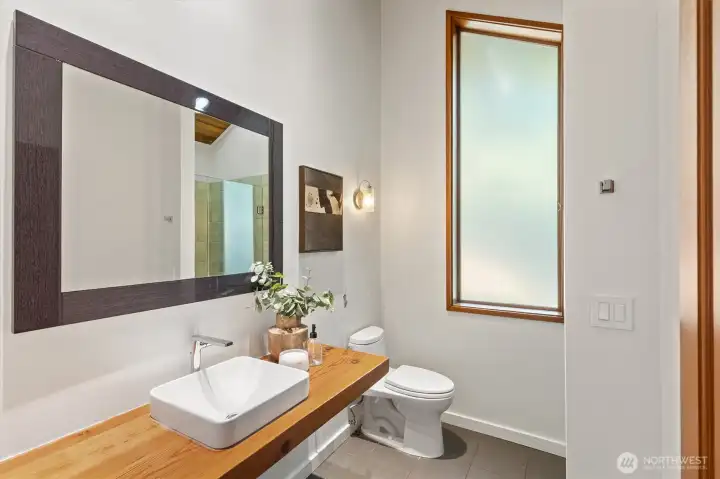 The convenient 3/4 bathroom on the main floor.