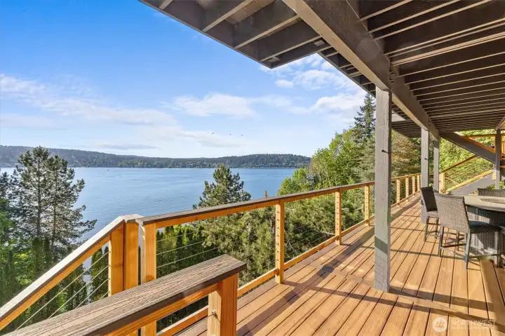 Entertain outdoors year-round on expansive view decks designed for unforgettable sunsets.