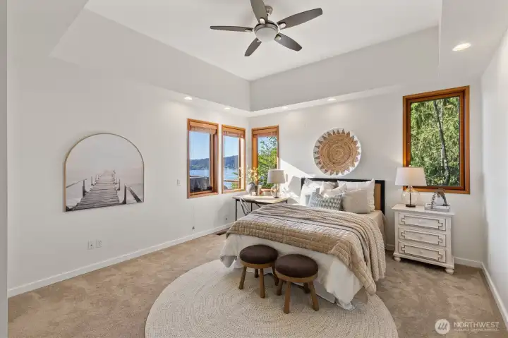 The light-filled 3rd bedroom offers views to the lake.