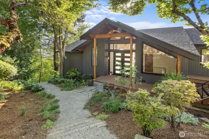 Distinctive architecture with mature growth surrounding. This home truly is one of a kind.