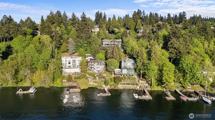 A handsome home sited just above the waterfront. Arrowhead Drive is prized.