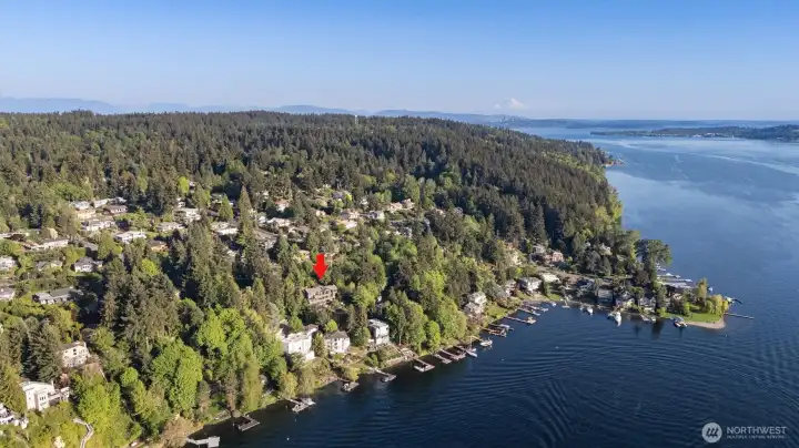 A home nestled in one of the Eastside's most coveted waterfront settings.