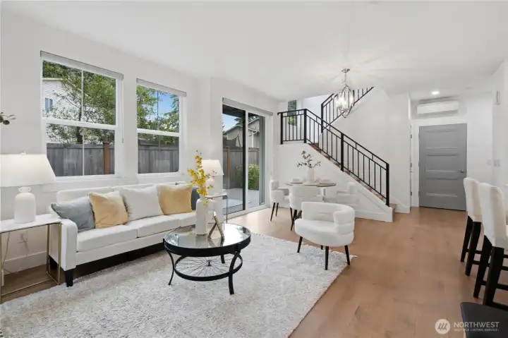 Living and dining area, with sliding door to back yard.
