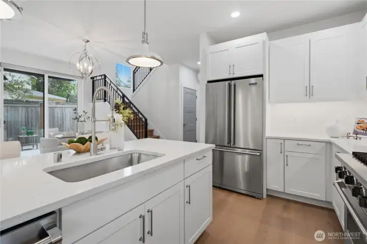 Kitchen with over-sized fridge.