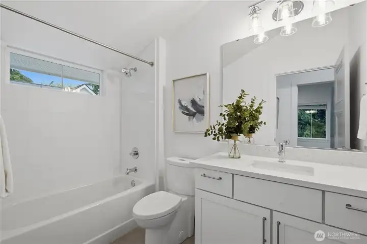 Hallway bath on upper level.