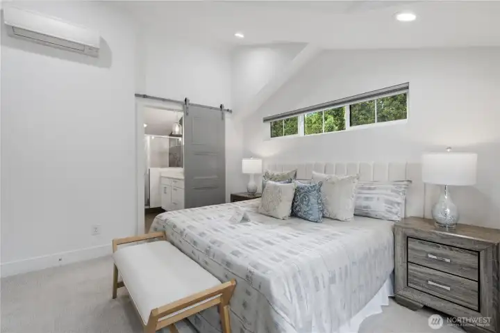 Primary bedroom with ensuite bath.