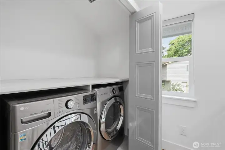 Washer & dryer on upper level.