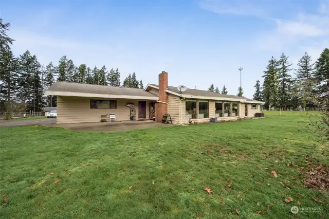 Expansive view of pasture behind home. Large patio for entertaining.