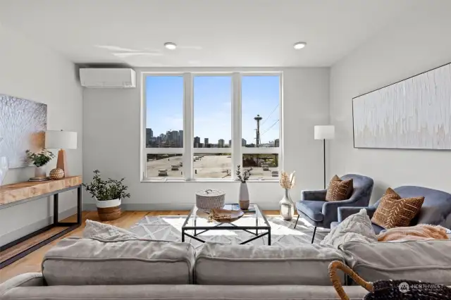 Living room facing South with space needle and downtown views