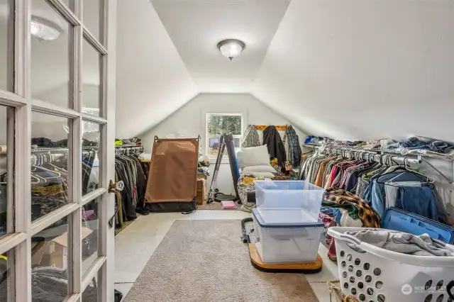 Currently used as huge walk in closet, this room could be used for various other purposes.