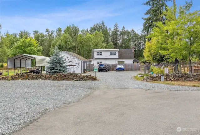 This is the view of the home from the driveway. The driveway splits off to the right here and leads to the other buildings.