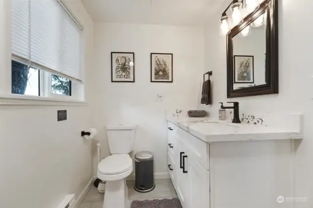 The remodeled bathroom is light and bright and lovely.