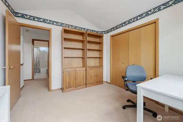 Another view of the bedroom, you can see the upstairs bathroom across the hallway.