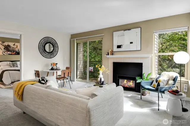 Expansive windows frame the natural scenery.