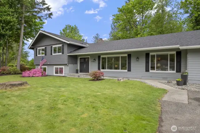 Expansive tri-level floor plan with seamless flow and versatile living spaces.