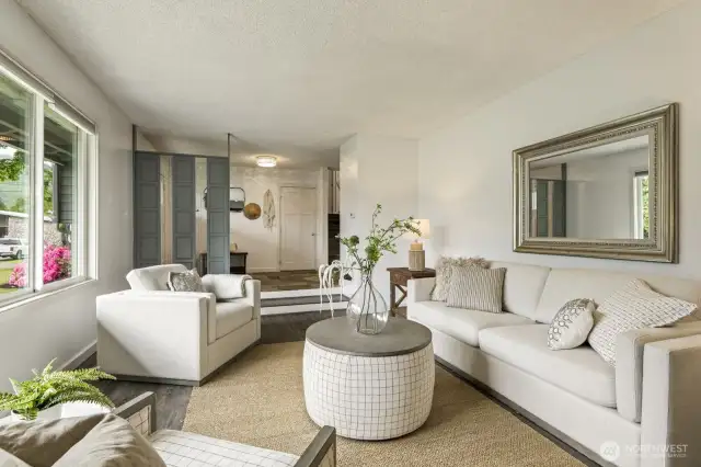 Step from the spacious foyer into a beautifully appointed living room retreat.