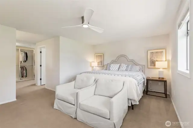 Primary suite offers impressive space—roomy enough for a full bedroom set, cozy seating area, or private retreat with plenty of natural light & comfort throughout