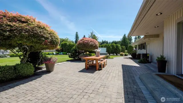 Step out onto the back patio & into the ultimate outdoor entertaining space—perfect for dining, relaxing, or hosting under open skies in a beautifully private setting