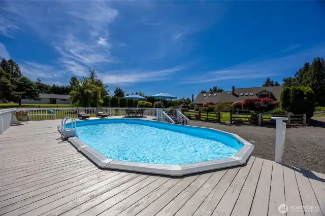 Resort-style pool & spacious deck offer a perfect setting for summer fun, entertaining, or unwinding poolside—designed for relaxation with plenty of room to gather & enjoy the outdoors