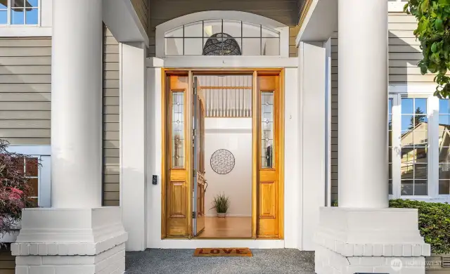 Elegant covered entry.