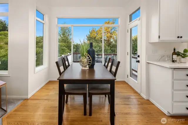 Lots of room in the eat in kitchen. The door leads to the deck.