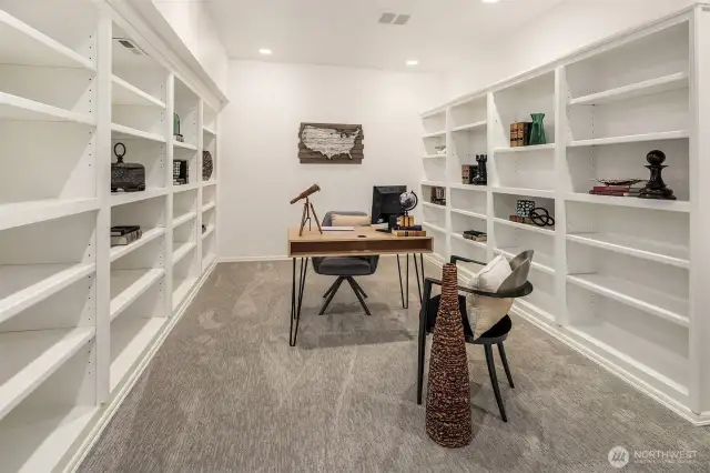 Spacious den with built ins on the lower level.